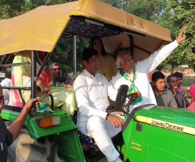 haryana-assembly-elections-2019-dushyant-chautala-drives-tractor-to-poll-booth-cm-khattar-rides-cycle