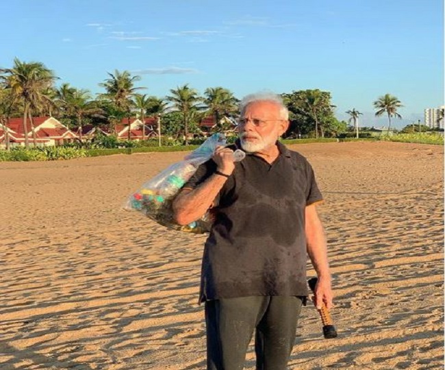 let-s-ensure-our-public-places-are-clean-pm-modi-seen-plogging-at-beach-in-mamallapuram-watch