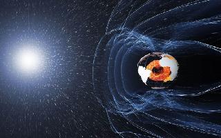 A dent in Earth's magnetic field is splitting into two as it gets bigger,..