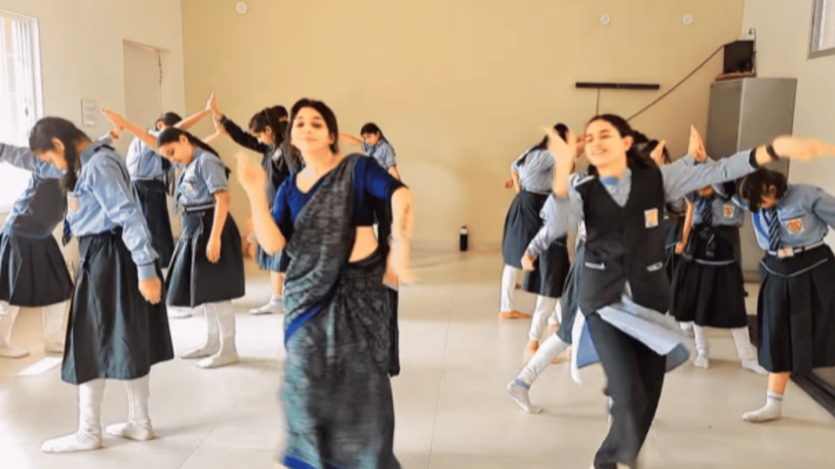 teacher-dance-to-dum-dum-song-goes-viral-video-leaves-internet-confused-about-statued-students-at-back-watch