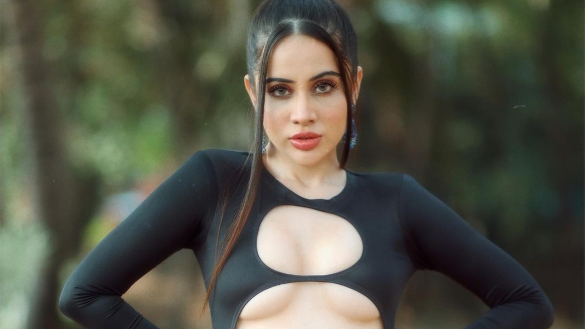 A model poses photographer wears new cleavage enhancing