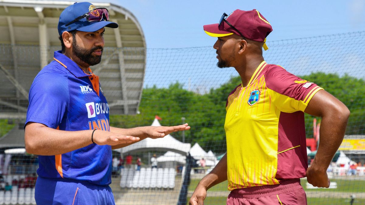 Indian captain Rohit Sharma in conversation with West Indies captain Kraigg Brathwaite