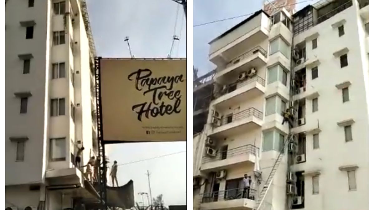 viral-video-guests-escape-miraculously-after-huge-fire-engulfs-hotel-in-mps-indore-watch