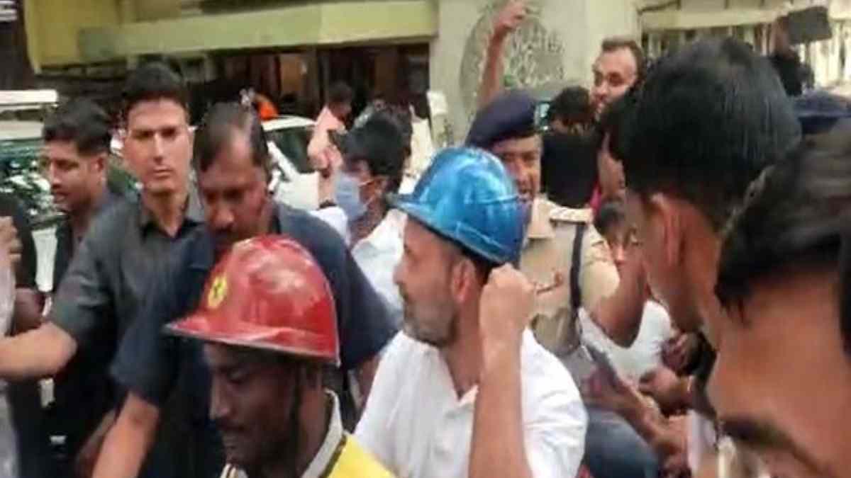 Watch: Rahul Gandhi Rides Pillion On Delivery Boy's Scooter After PM Modi's  Mega Roadshow In Bengaluru