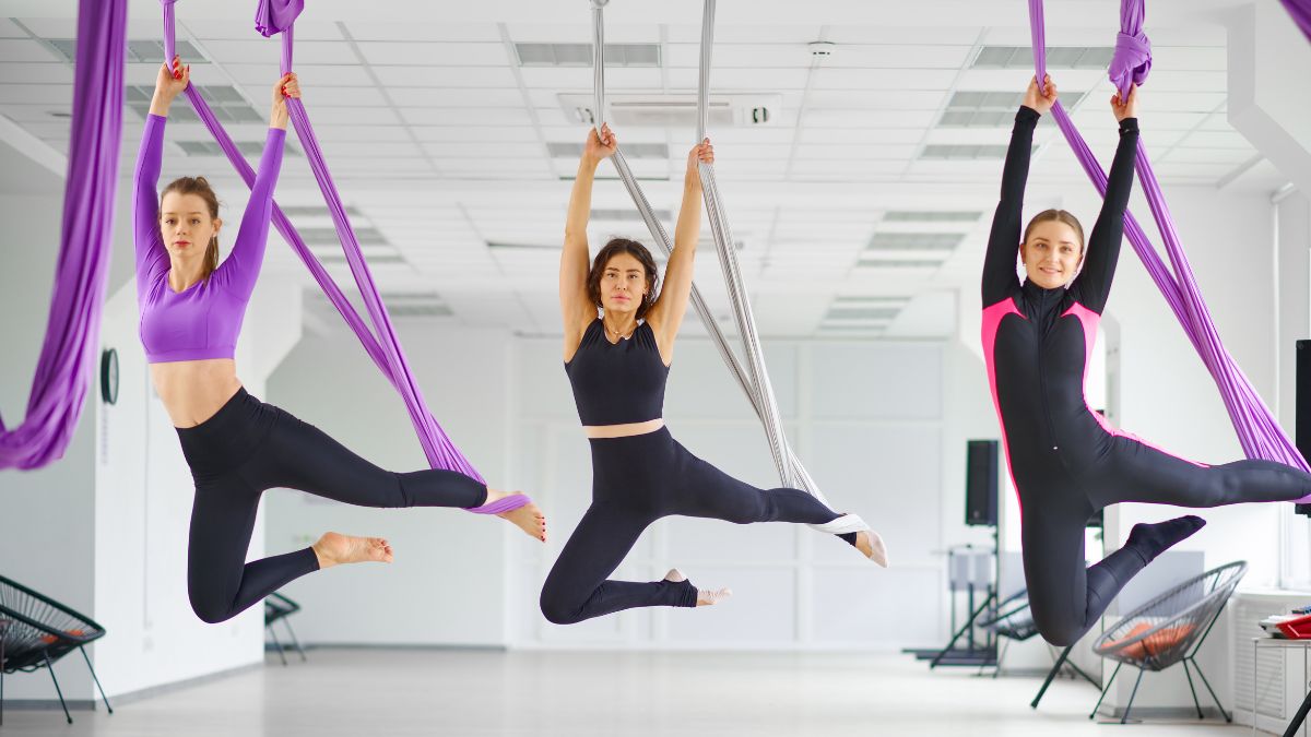 5 Amazing Benefits Of Aerial Yoga That Will Take Your Workout To Another  Level