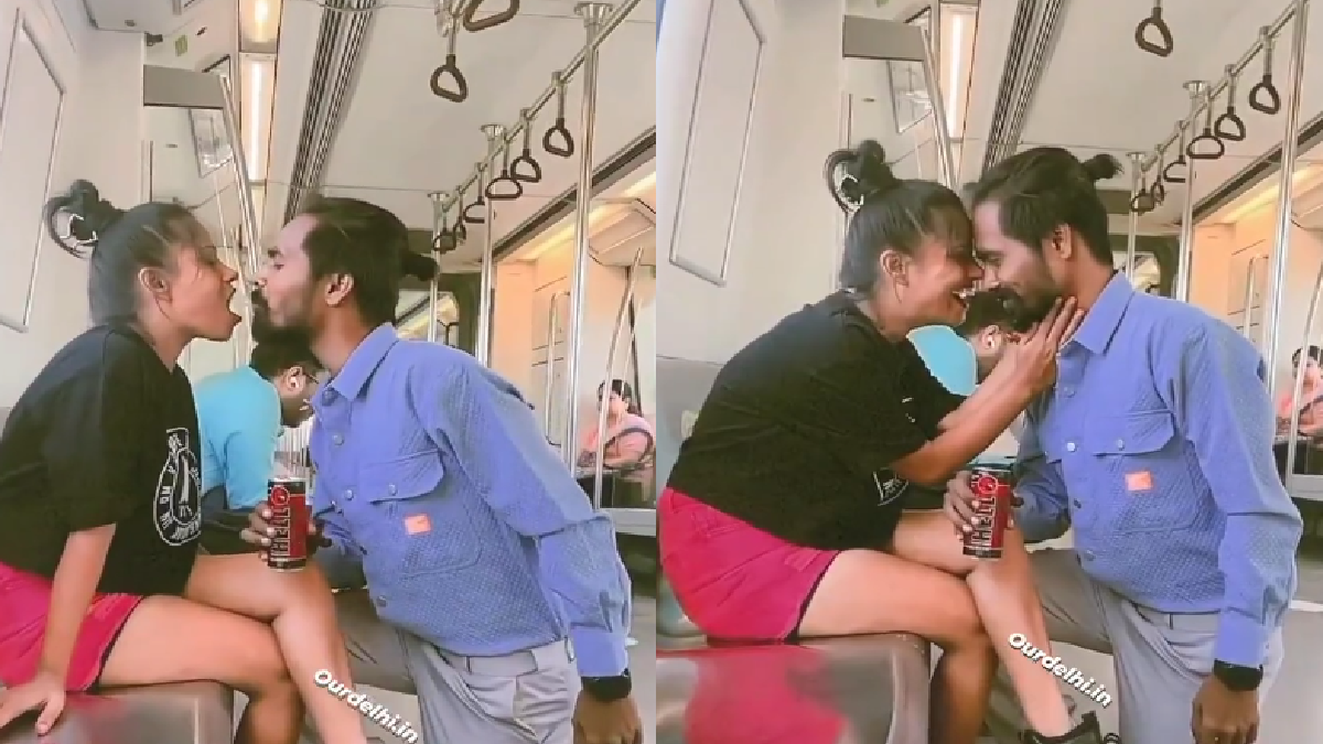 delhi-metro-woman-spits-drink-in-partner-mouth-in-viral-video-netizens-say-harpic-chahiye-ankhe-dhoni-hai-watch