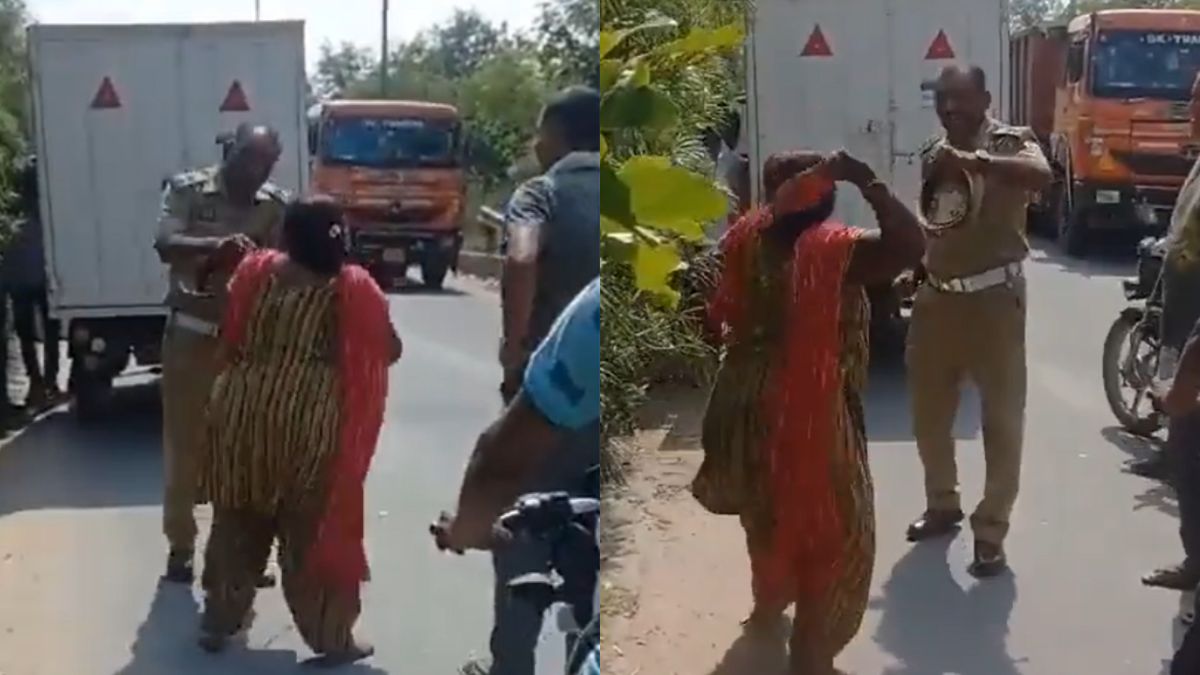 ghaziabad-news-woman-erickshaw-driver-hits-traffic-policeman-with-slippers-in-indirapuram-watch