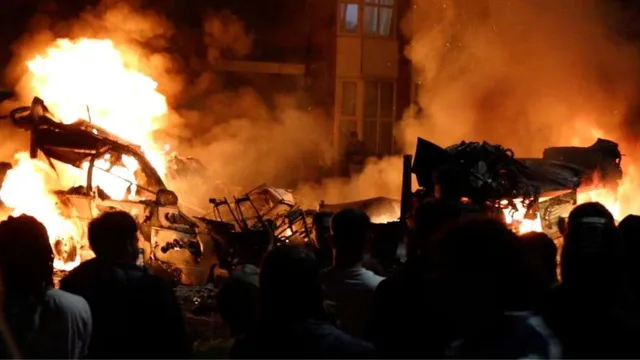 uk-riots-violence-erupts-in-leeds-as-rioters-set-bus-on-fire-overturn-police-car-watch-video