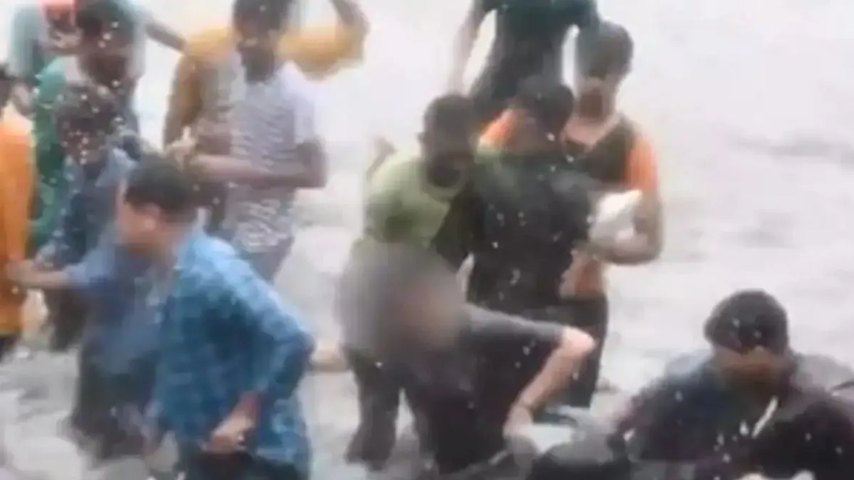 viral-video-group-of-men-harasses-woman-riding-bike-in-flood-affected-area-in-lucknow-probe-on