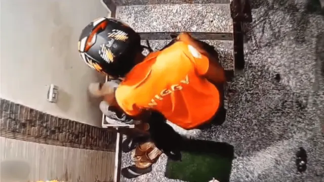 caught-on-cctv-viral-video-shows-swiggy-delivery-boy-stealing-shoes-from-outside-apartment