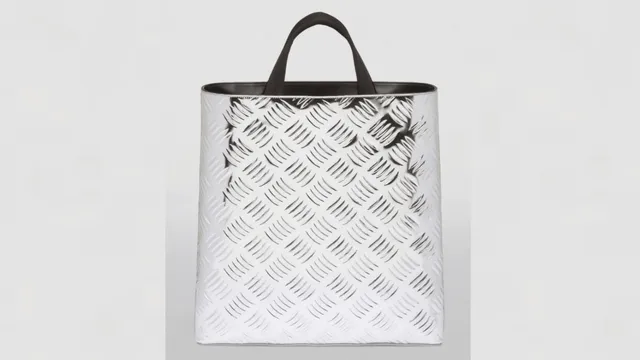 prada-recently-launched-tote-bag-reminds-desis-of-indian-bus-and-train-floor-product-worth-rs-3-lakh-draws-flak