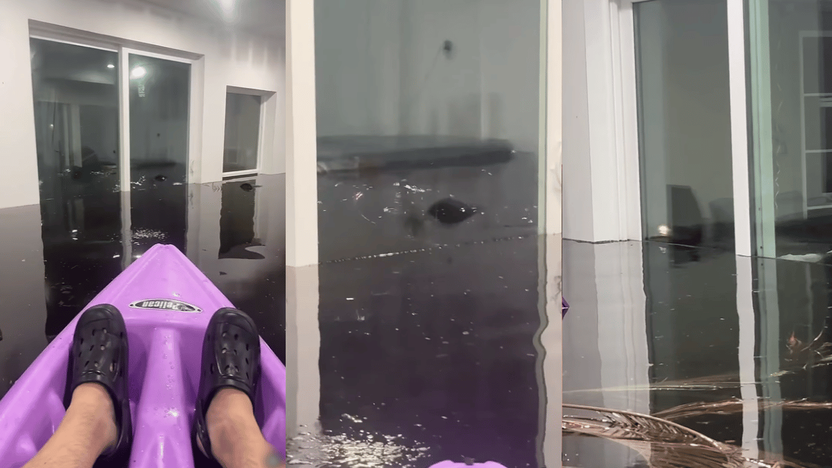 viral-video-shows-man-casually-kayaking-inside-water-submerged-house-amid-hurricane-aftermath-internet-reacts