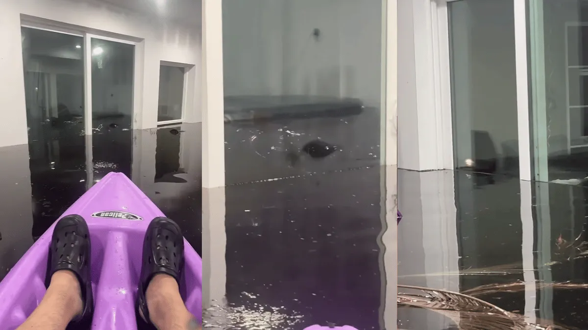 viral-video-shows-man-casually-kayaking-inside-water-submerged-house-amid-hurricane-aftermath-internet-reacts