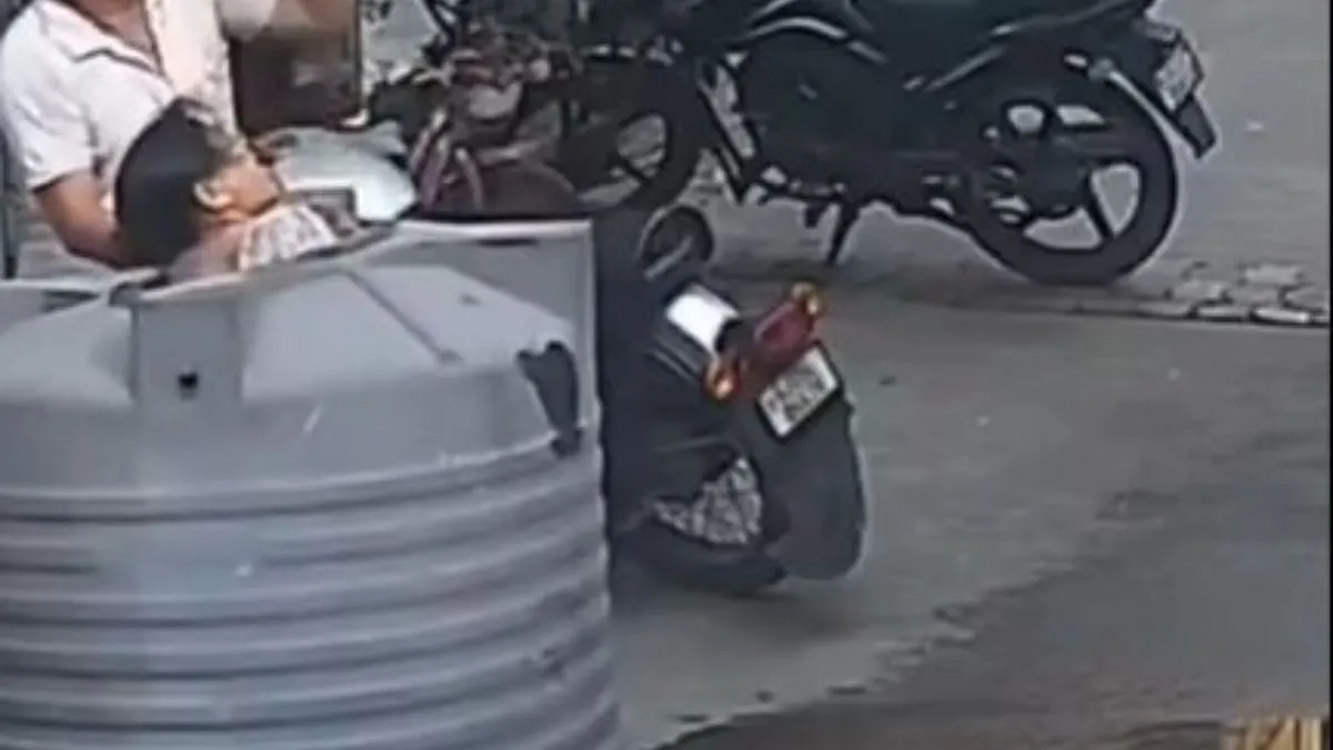 gujarat-water-tank-falls-on-woman-as-she-walks-eating-apple-on-surat-road-heres-what-happens-next-watch