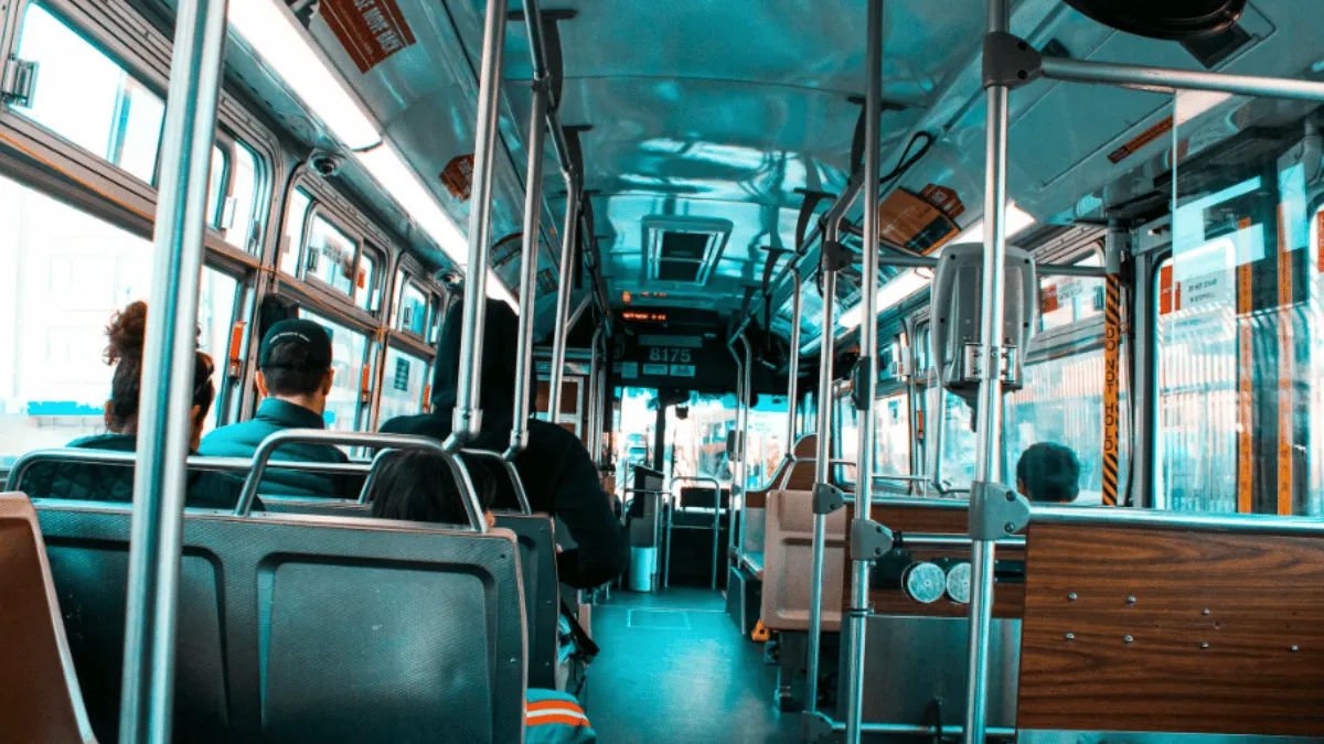 bizarre-viral-video-shows-man-hanging-at-bus-door-after-conductor-allegedly-refused-to-open-it