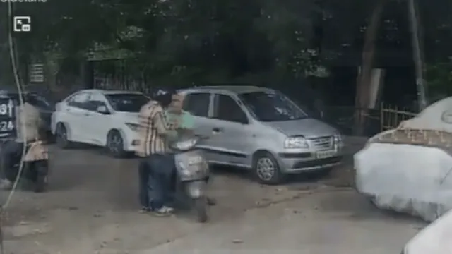 bike-riding-men-snatch-delhi-man-gold-chain-after-taking-away-his-scooter-key-viral-video