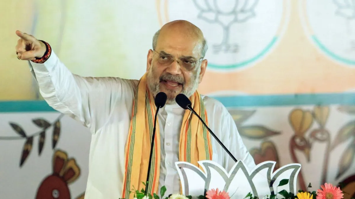 bjp-jharkhand-manifesto-rs-2100-gogo-didi-yojna-ucc-tribal-lands-free-lpg-cylinder-yuva-sathi-amit-shah-ranchi-list