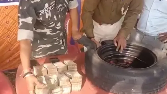 jharkhand-rs-50-lakh-found-hidden-in-spare-tyre-near-bihar-border-bjp-alleges-jmmcongress-corruption-video