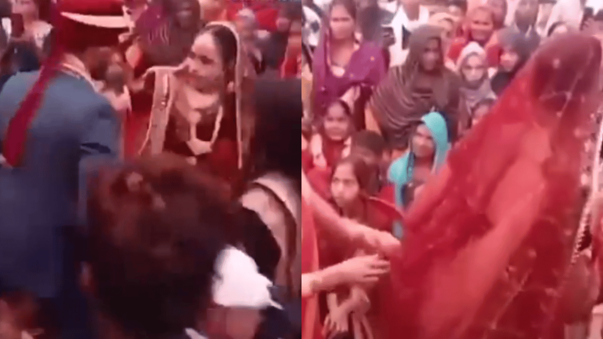 rebellious-bride-refuses-to-step-on-stage-groom-aggressive-pull-makes-it-worse-viral-video