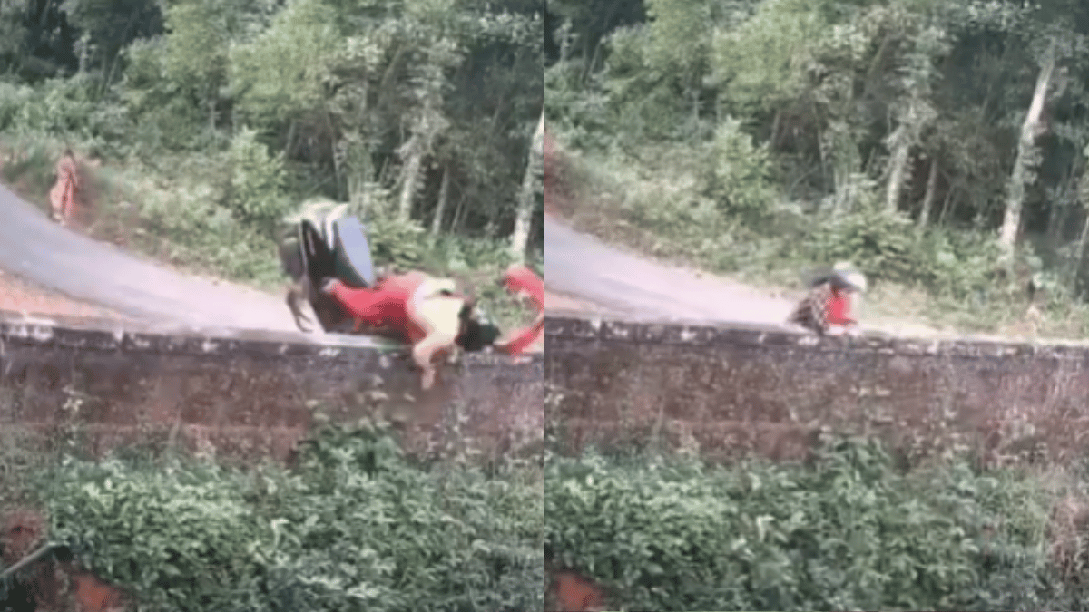 how-not-to-drive-scooty-101-women-flies-over-the-wall-after-driver-crashes-two-wheeler-into-bridge