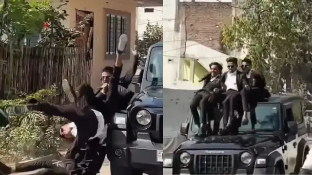 viral-video-12th-class-students-fall-from-moving-thar-while-trying-to-make-heroic-entry