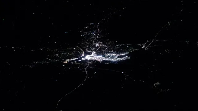 mahakumbh-2025-nasa-astronaut-shares-stunning-pics-of-largest-human-gathering-from-space-as-prayagraj-glitters