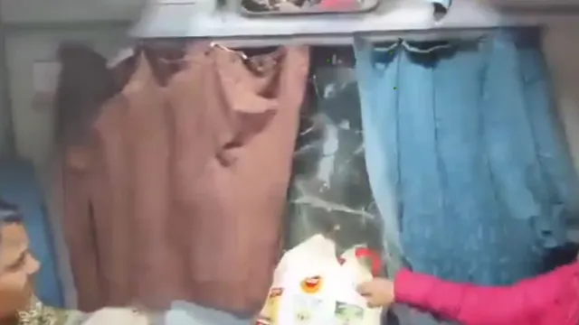 unable-to-board-train-for-mahakumbh-frustrated-devotees-in-bihar-throw-stones-and-damage-ac-coach-windows-viral-video