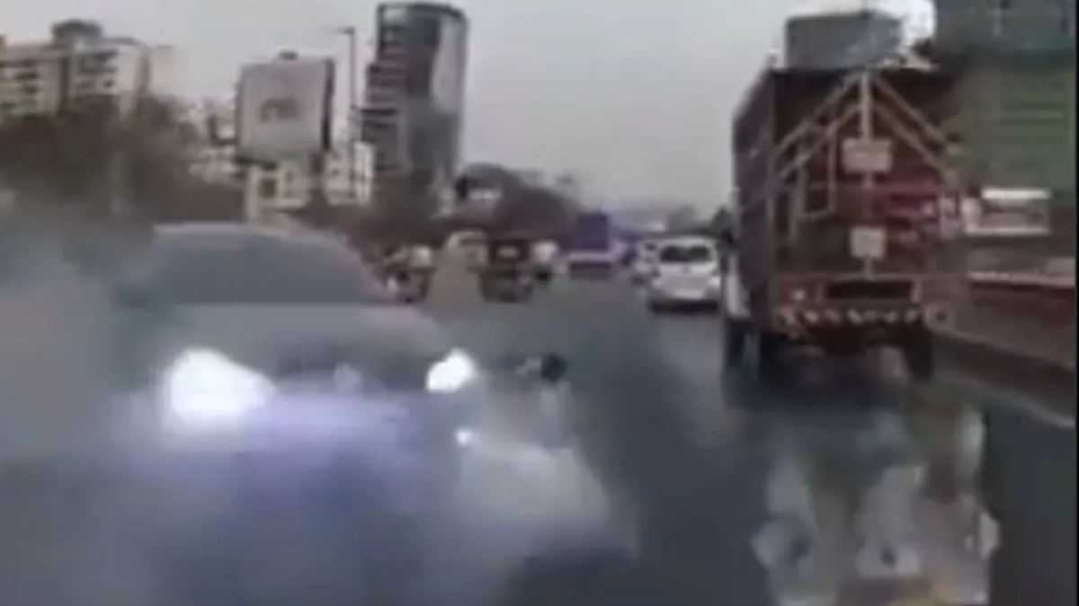 viral-video-two-people-thrown-into-air-after-speeding-sedan-crashes-into-bike-on-mumbaipune-highway