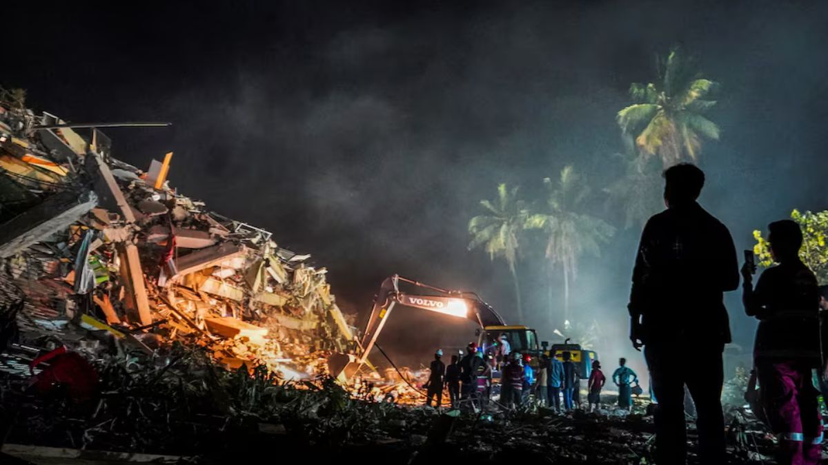 People look on as search and rescue operations continue in the aftermath of a strong earthquake, in Mandalay, Myanmar