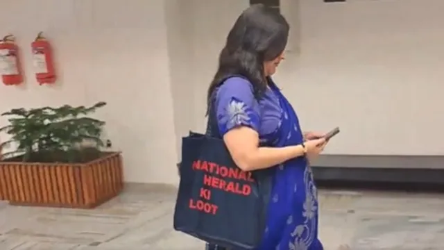 national-herald-ki-loot-bansuri-swaraj-walks-in-for-jpc-meet-with-priyankastyle-tote-messaging-video