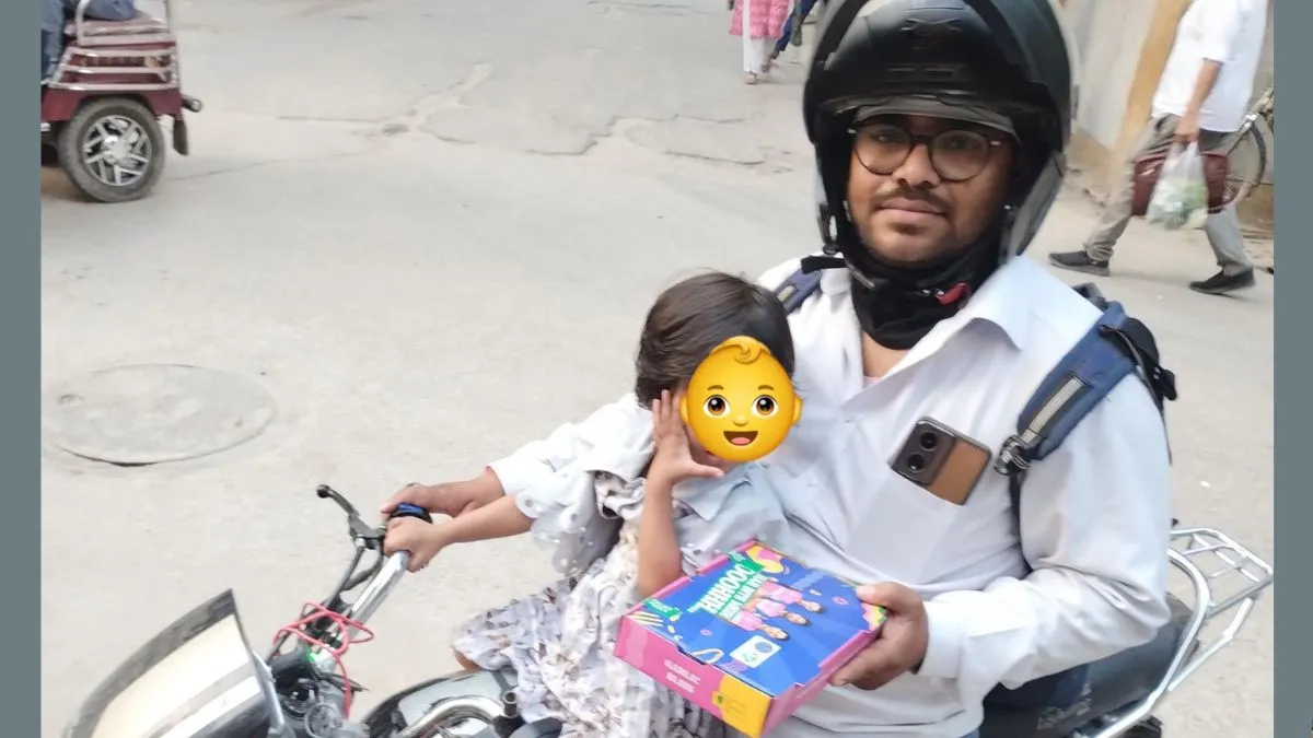 swiggy-delivery-agent-rides-with-2-year-old-daughter-to-complete-orders-viral-post-melts-hearts-online