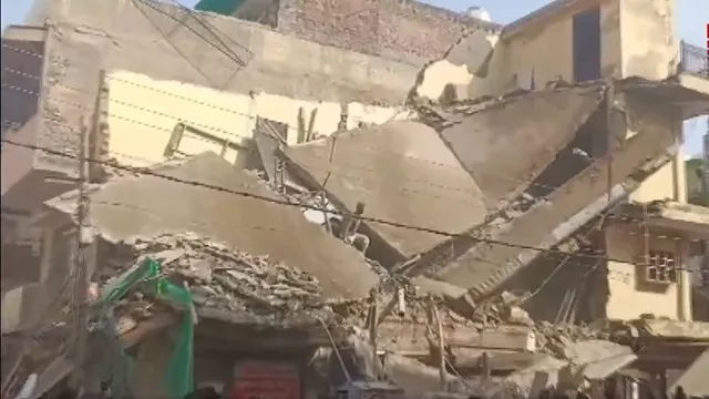 delhi-building-collapses-in-rohinis-sector-7-two-feared-trapped-rescue-operations-underway
