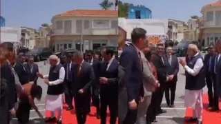 Cyprus Lawmaker Touches PM Modi’s Feet During Welcome Ceremony; Watch Viral Video