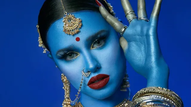 rapper-genesis-yasmine-mohanraj-sparks-outrage-for-dressing-as-goddess-kali-and-licking-crucifix