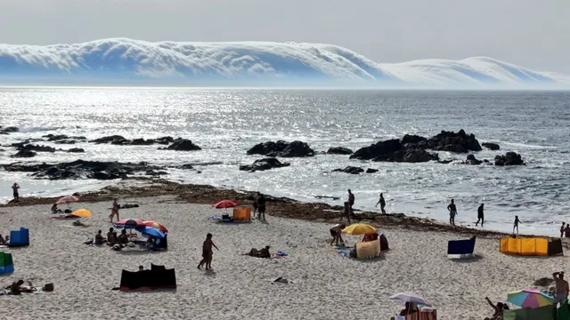 rare-roll-cloud-spotted-over-portuguese-beach-amid-severe-heatwave-watch-viral-video