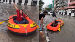 Man Turns Flooded Delhi Street Into Boating Adventure In Inflatable Raft; Hilarious Jugad Video Takes Internet By Storm