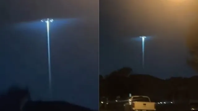 viral-video-of-ufo-dropping-light-beam-leaves-people-shocked-and-questioning-if-its-real-thats-just-a-stadium-light