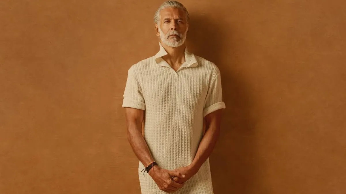 milind-soman-redefines-masculinity-in-white-slit-bodycon-dress-breaks-fashion-norms-with-genderless-iconic-look