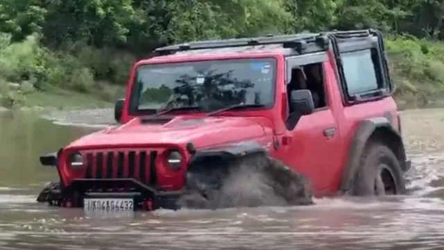 youtuber-sourav-joshi-drives-mahindra-thar-into-river-gets-stuck-internet-slams-reckless-stunt