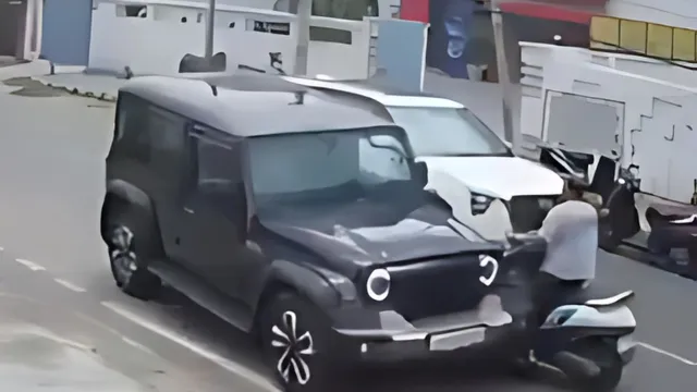 watch-mahindra-thar-roxx-hits-scooter-rider-in-jammu-police-arrests-father-heres-what-law-says