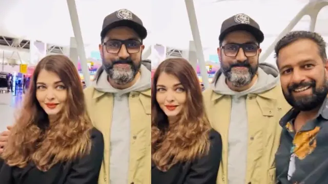 abhishek-bachchan-holds-aishwarya-rai-close-as-couple-pose-for-selfie-with-fan-during-vacation