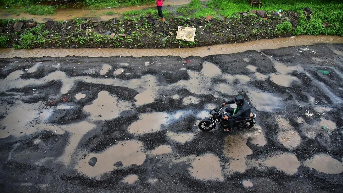 bengaluru-hennur-bagalur-road-faces-criticism-as-potholes-persist-bbmp-inaction-draws-ire