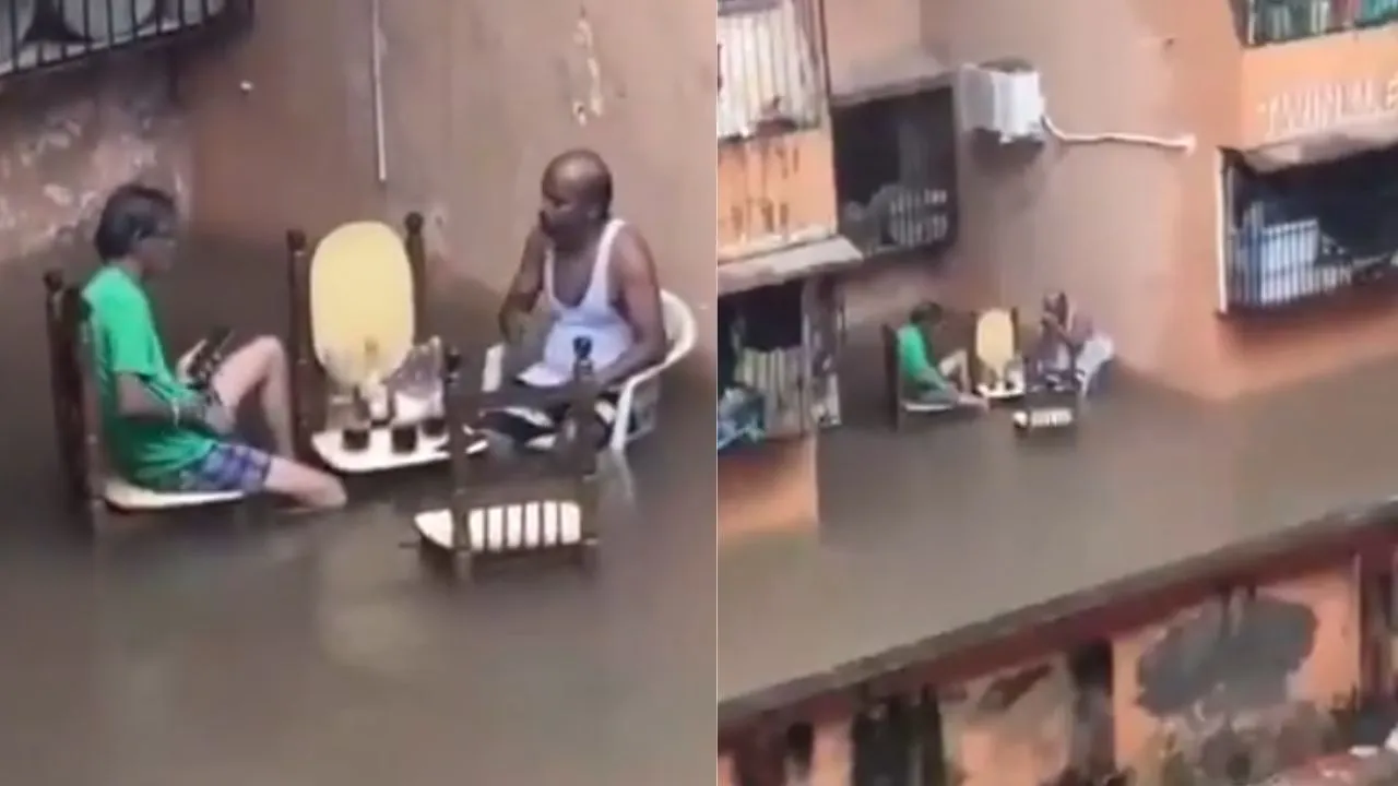 viral-video-shows-mumbaikars-enjoying-drinks-in-knee-deep-floodwater-turning-mumbai-rain-into-moment-of-fun