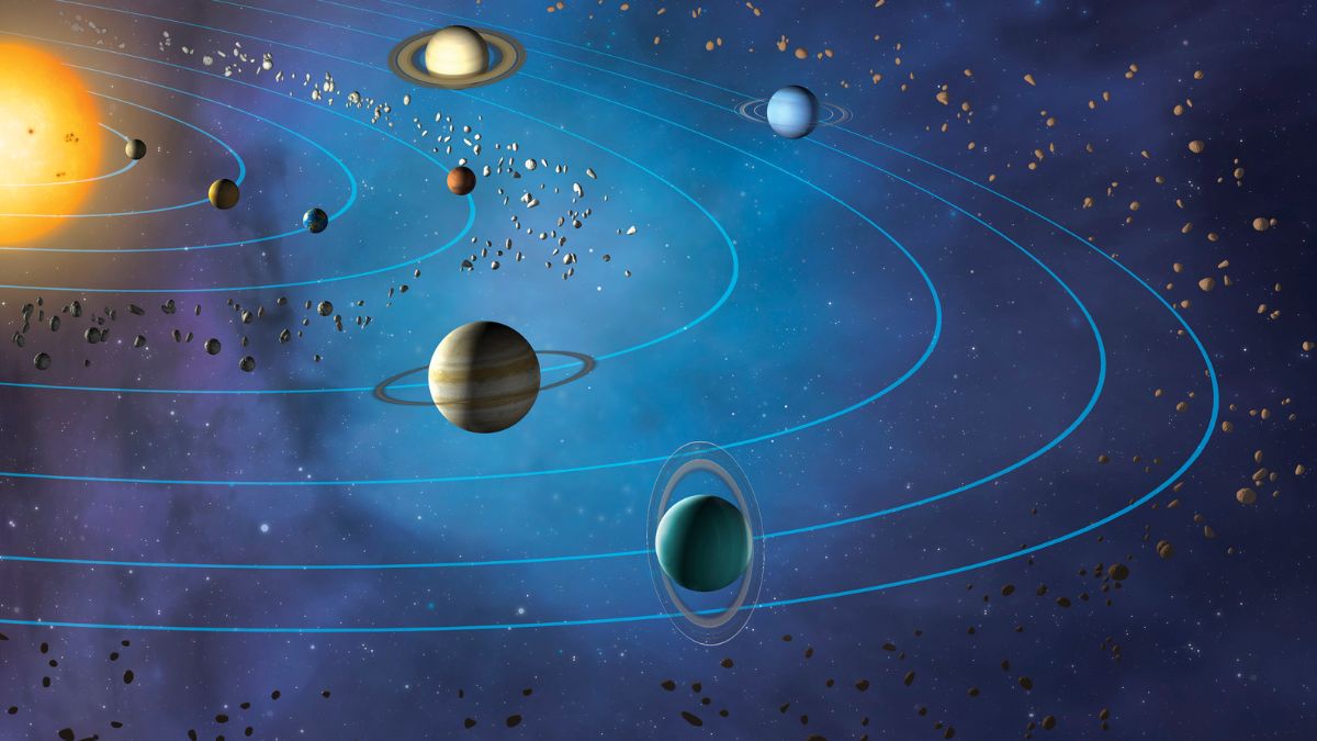 when and why pluto was removed from solar system