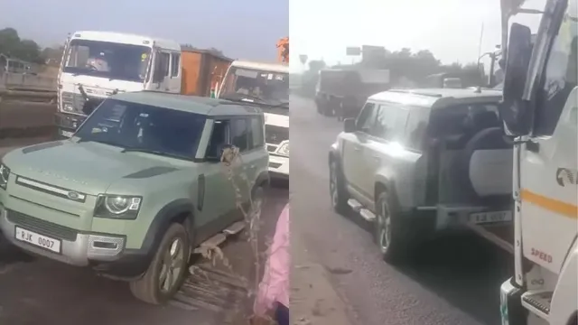 watch-its-an-elephant-people-as-land-rover-defender-pulls-truck-loaded-with-crane