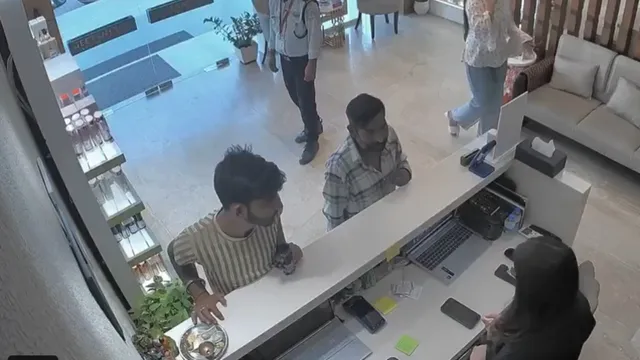 viral-video-shows-two-men-stealing-cash-from-puja-thali-at-hair-salon-netizens-ask-watchman-andha-hai-kya
