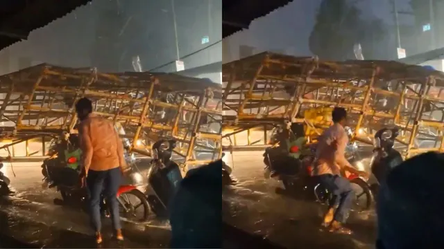 auto-driver-survives-miracle-escape-as-massive-hoarding-collapses-viral-video-shows-heart-stopping-moment