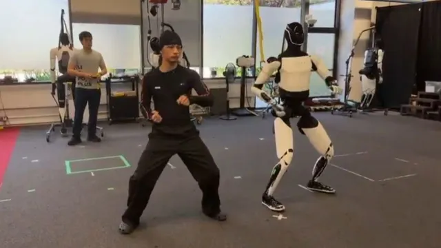 teslas-humanoid-robot-optimus-shows-off-impressive-kung-fu-moves-viral-video-leaves-internet-stunned