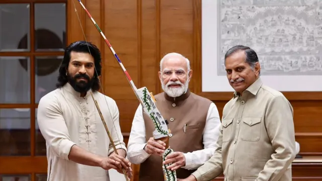 ram-charan-anil-kamineni-and-archery-premier-league-delegation-present-symbolic-bow-to-pm-modi-celebrating-apls-success