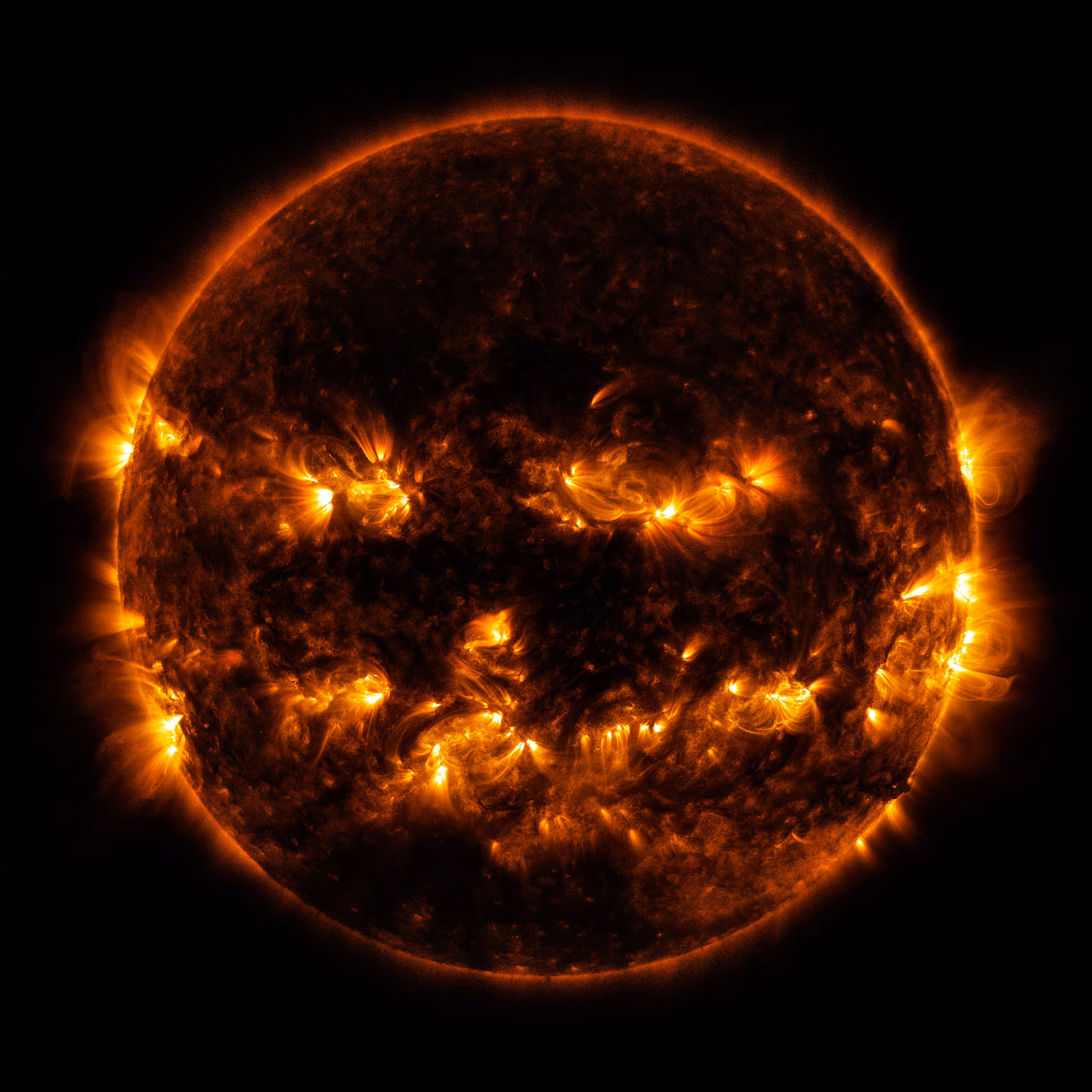 Active regions on the sun combine to look something like a jack-o-lantern's face. REUTERS/NASA